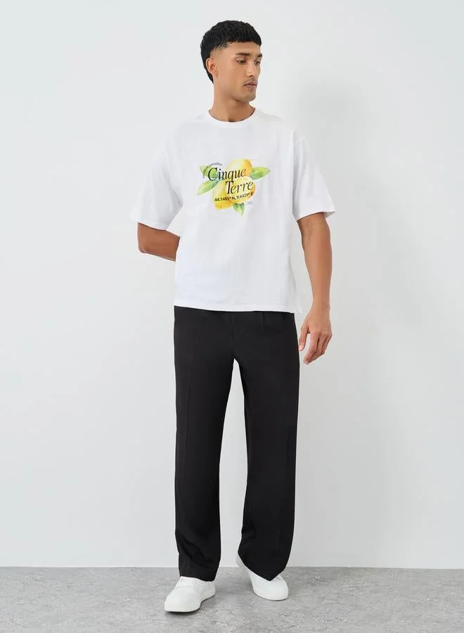 ستايلي تيشيرت ستايلي بطبعة جرافيك بياقة دائرية بقصة واسعة