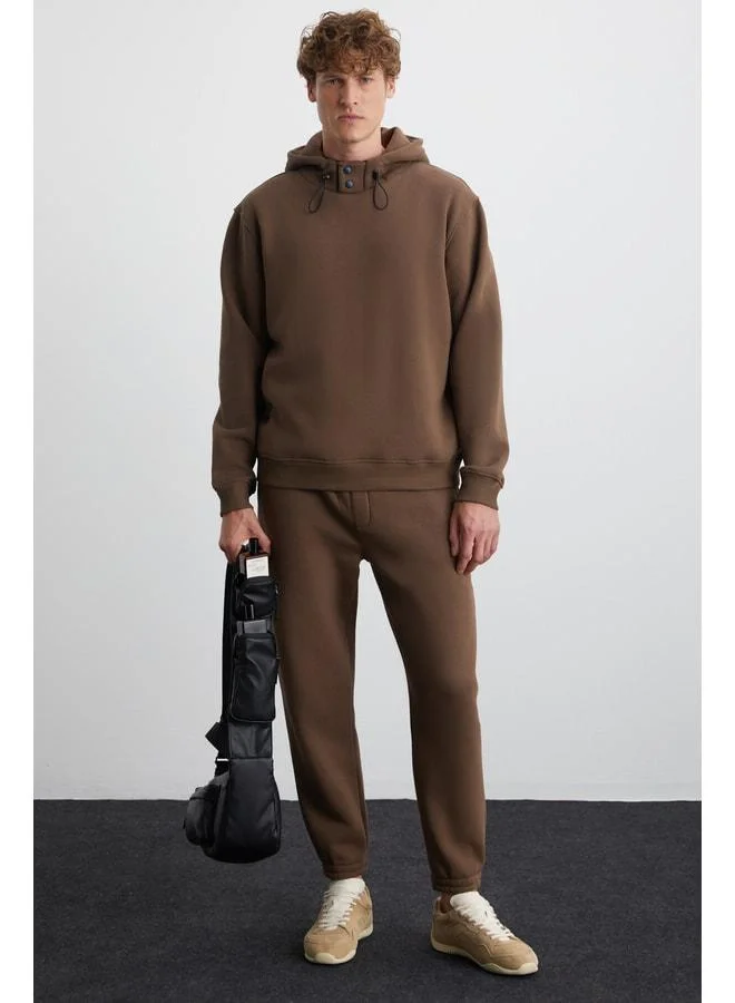 GRIMELANGE Ludwig Men's Organic Cotton Fabric Parachute Zipper Pocket Lined with Fleece Brown Sweatpants.