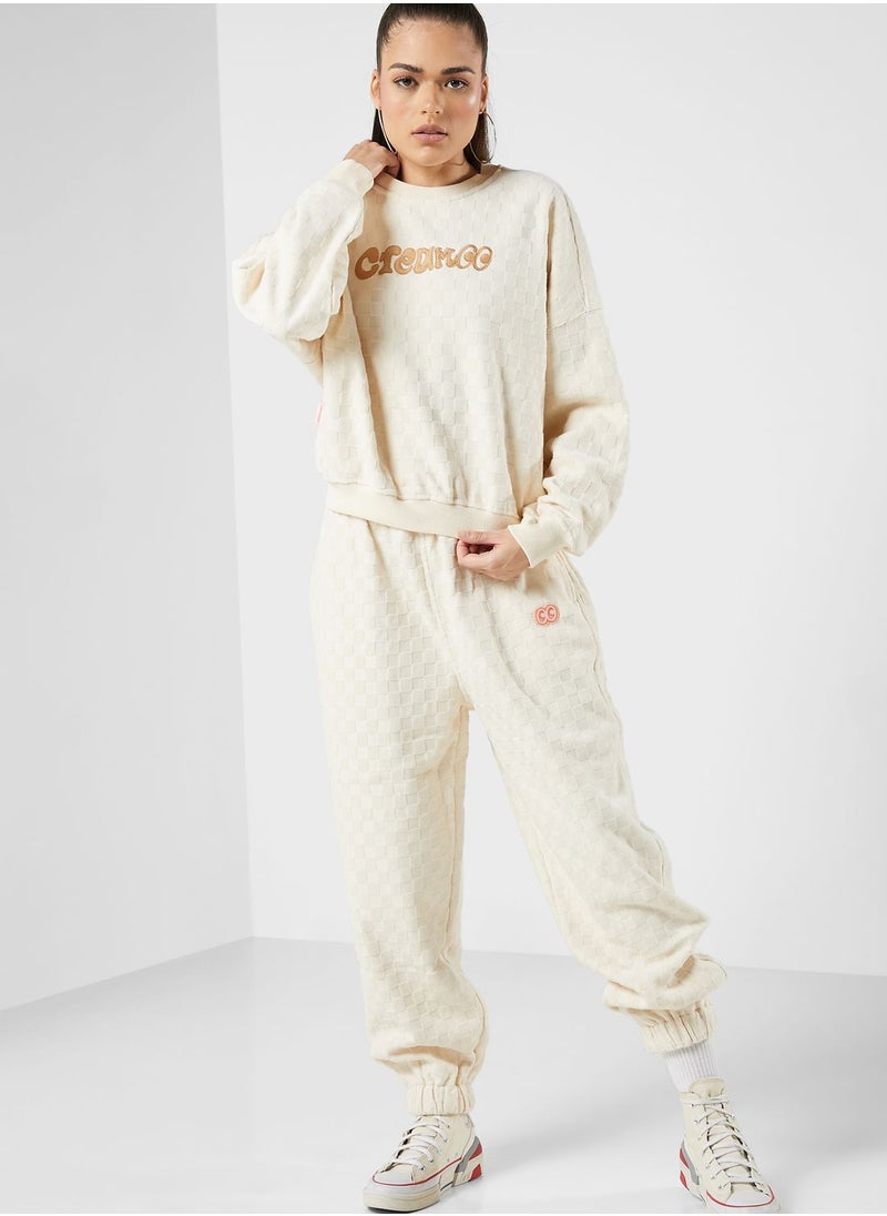 Mini Cream - Tonal Racing Checker Sweatpants - Image 1