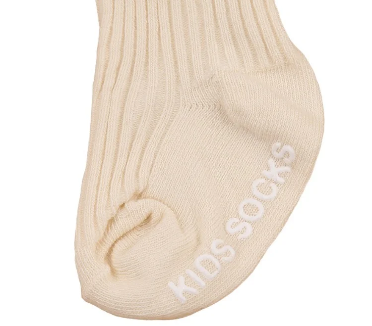 دىدانيالا مجموعة بريانا طوق شعر وجوارب باللون البيج والزهور للأطفال الرضع - كريمي