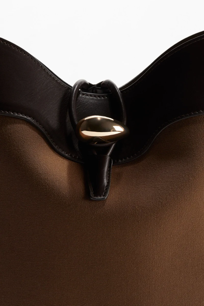 اتش اند ام حقيبة باكيت