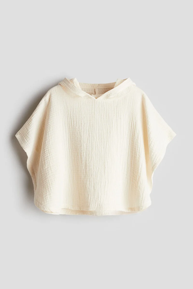 اتش اند ام منشفة بونشو من قطن الموسلين