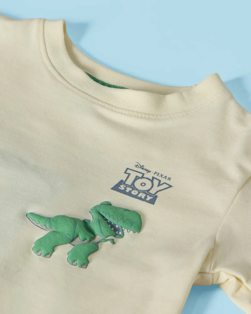 ردتاغ تي شيرت للأولاد الرضع بتصميم Toy Story Dino باللون الأبيض