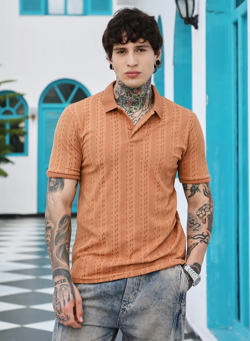 Campus Sutra Campus Sutra Men's Rust Orange Geometric-Folk Knitted Polo T-Shirt | Jacquard Polo Neck , Short Jacquard Cuff Sleeves , Button Closure , Straight Hem | Polyester Blend T-shirt For Casual Wear