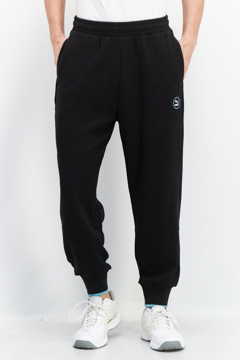 PUMA Men Sportswear Fit Brand Logo Drawstring Training Sweatpants, Black  - Image 1