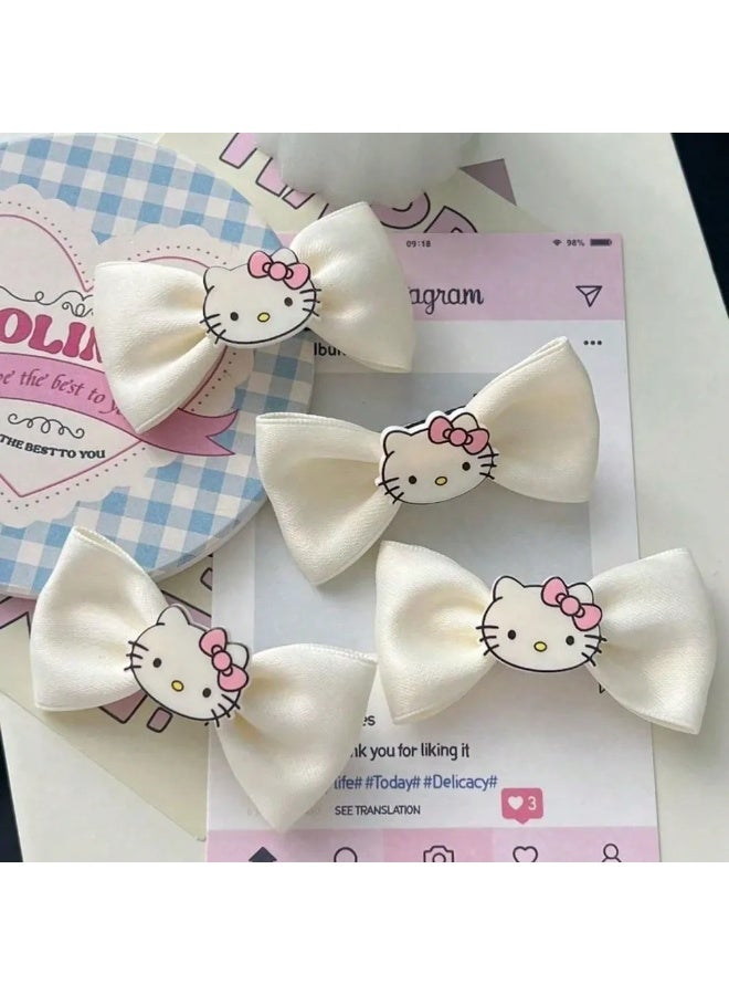 هالو كيتي مشابك شعر هيلو كيتي مجموعه من 4 قطع مشابك شعر مصنوعه من قماش الساتان الناعم الذي لا يتشابك مع الشعر. - Image 1