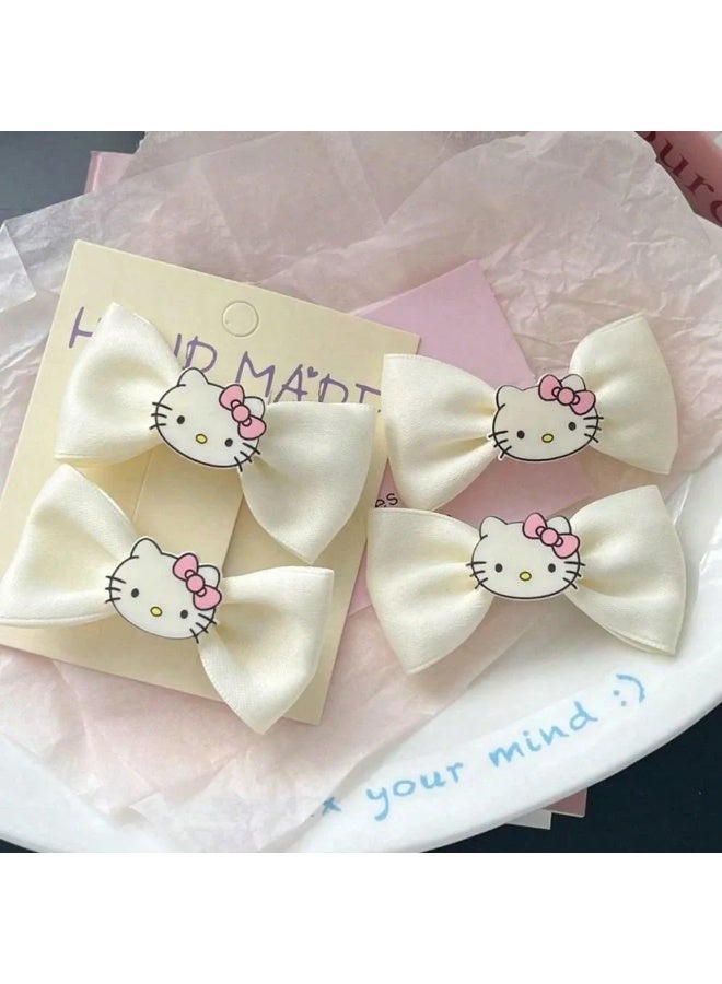 هالو كيتي مشابك شعر هيلو كيتي مجموعه من 4 قطع مشابك شعر مصنوعه من قماش الساتان الناعم الذي لا يتشابك مع الشعر. - Image 2