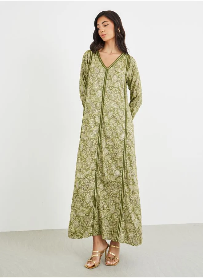 أميرة Amirah All-Over Printed V Neck Jalabiya with Lace Trim