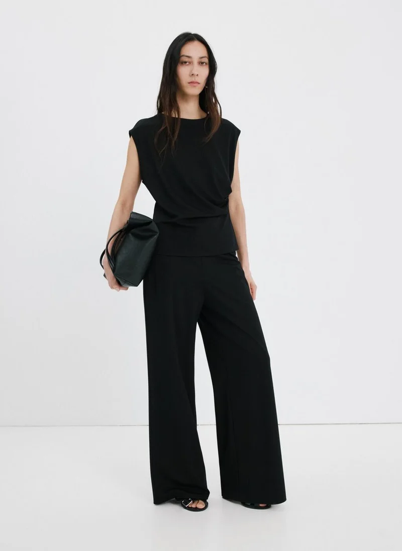 MANGO  Straight-fit trousers with elastic waist for Women | Best Price UAE