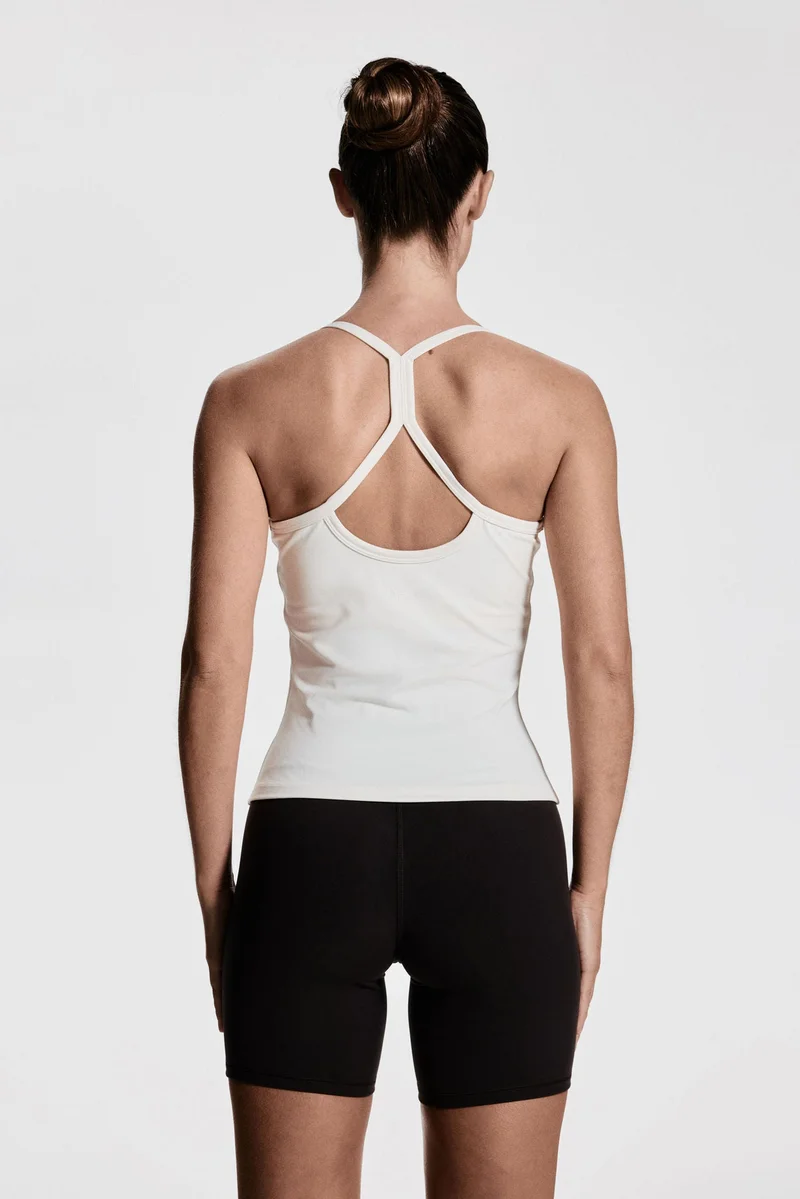H&M Integral-bra sports strappy top with SoftMove™