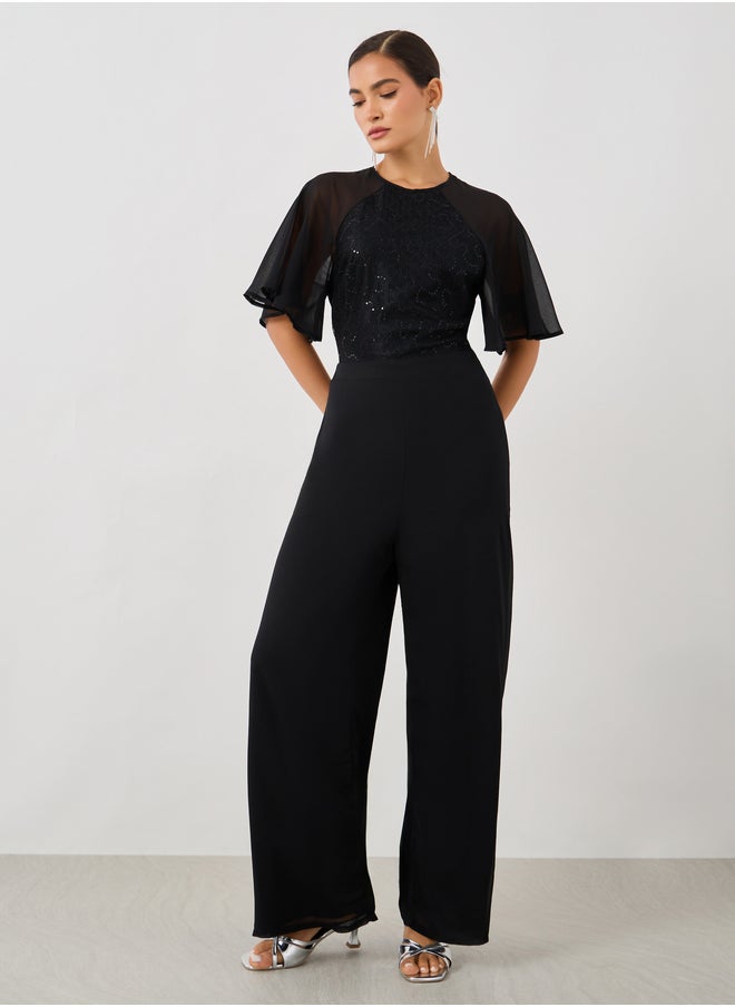 Styli Embellished Flutter Sleeve Wide Leg Jumpsuit  - Image 1