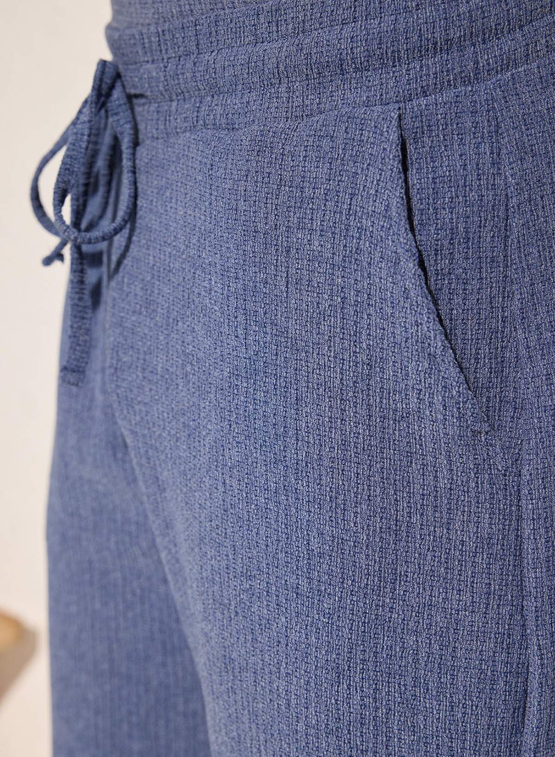 trendyol Indigo Straight Cut Textured Open Leg Sweatpants Tmnss25Ea00008 - Image 4
