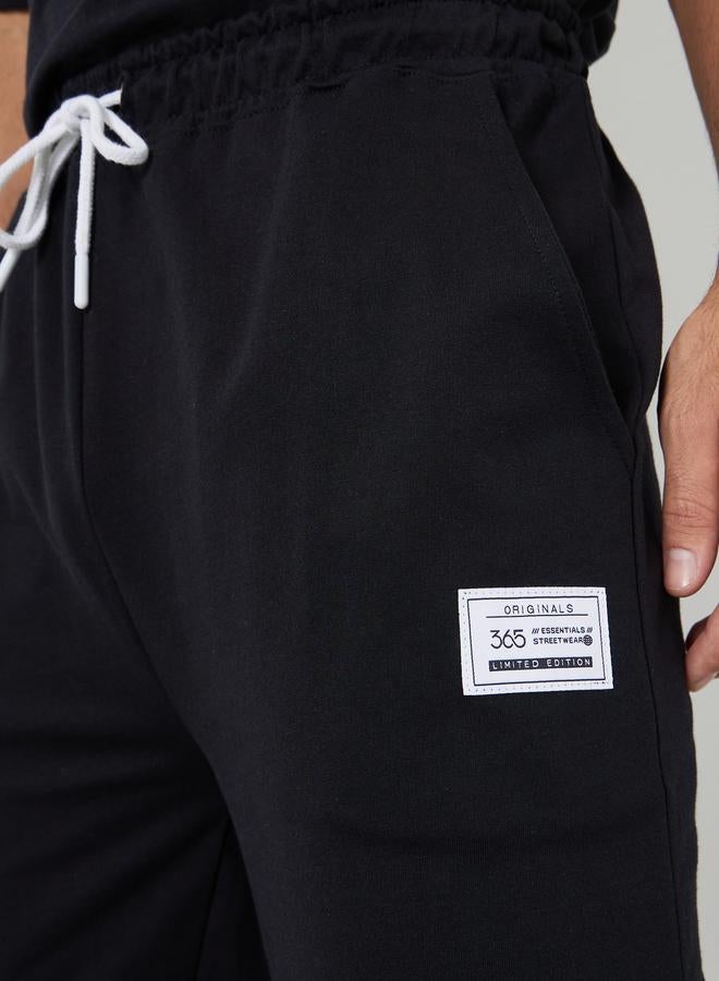 Styli Men Black Straight Fit Badge Detail Joggers - Image 3