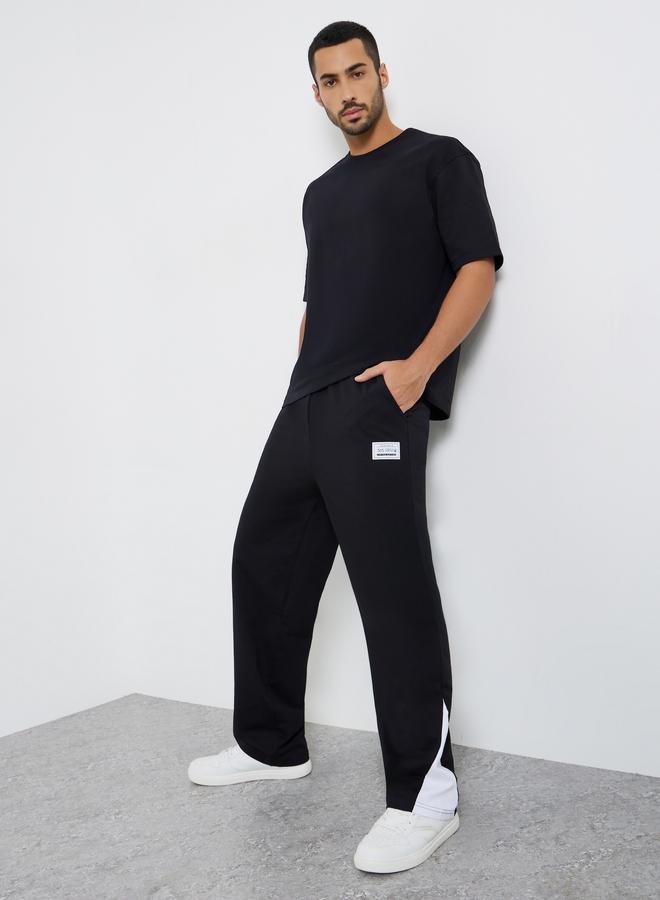 Styli Men Black Straight Fit Badge Detail Joggers - Image 2
