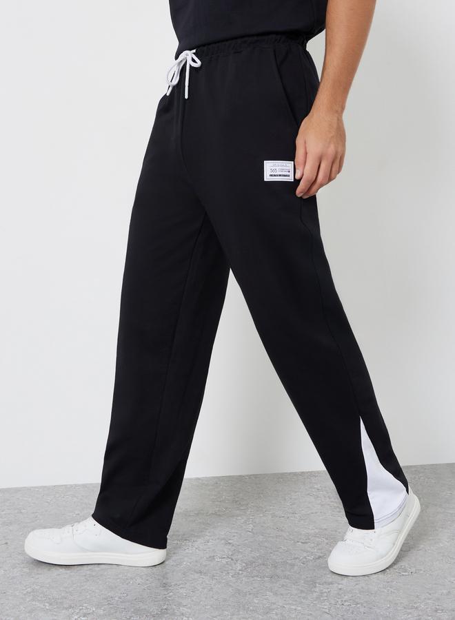 Styli Men Black Straight Fit Badge Detail Joggers - Image 1