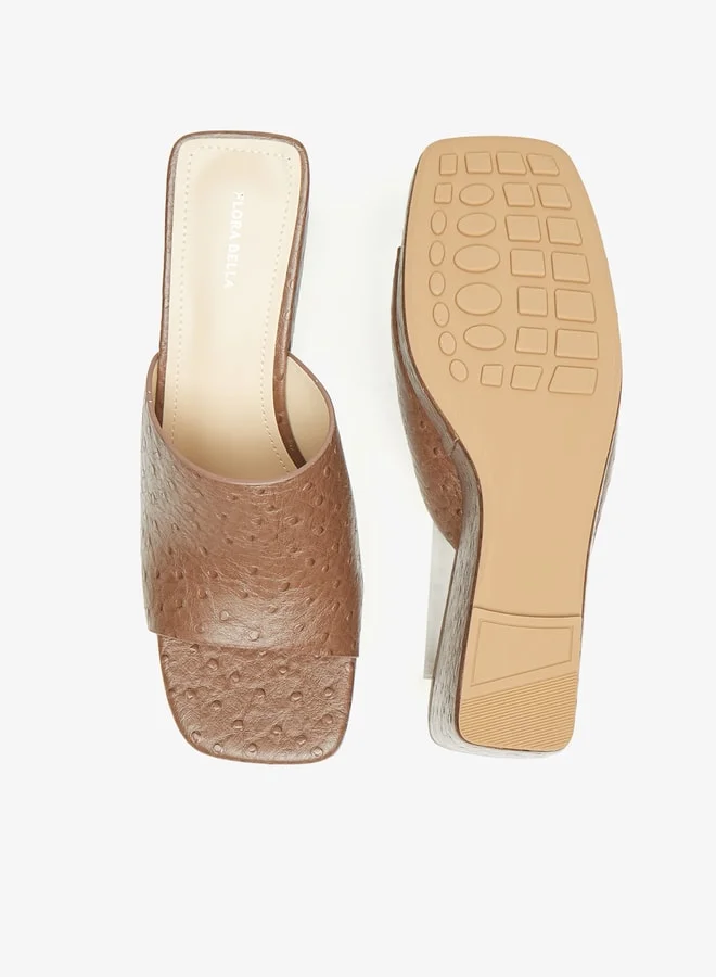 فلورا بيلا من شو إكسبرس Women's Textured Slip-On Sandals With Wedge Heels
