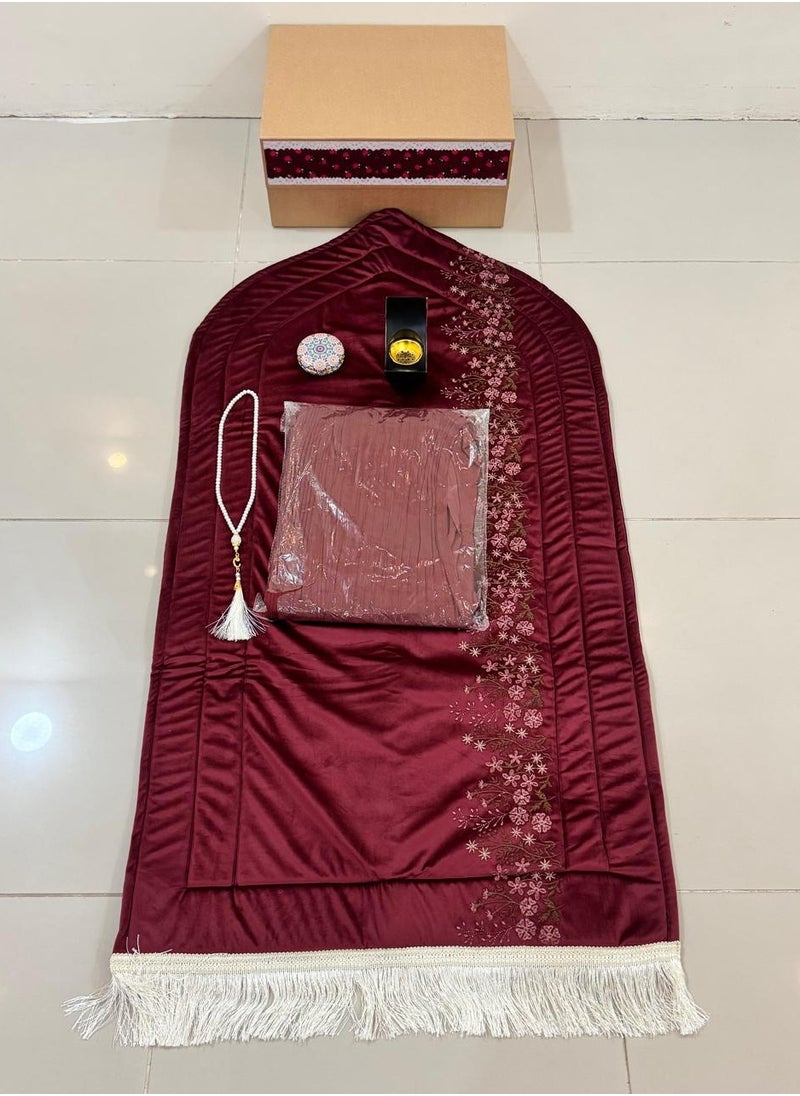 A box of prayer rugs consisting of 5pieces: an embroidered prayer rug + a silk embroidered prayer sheet + a crescent-shaped incense burner with a mirror + a rosary