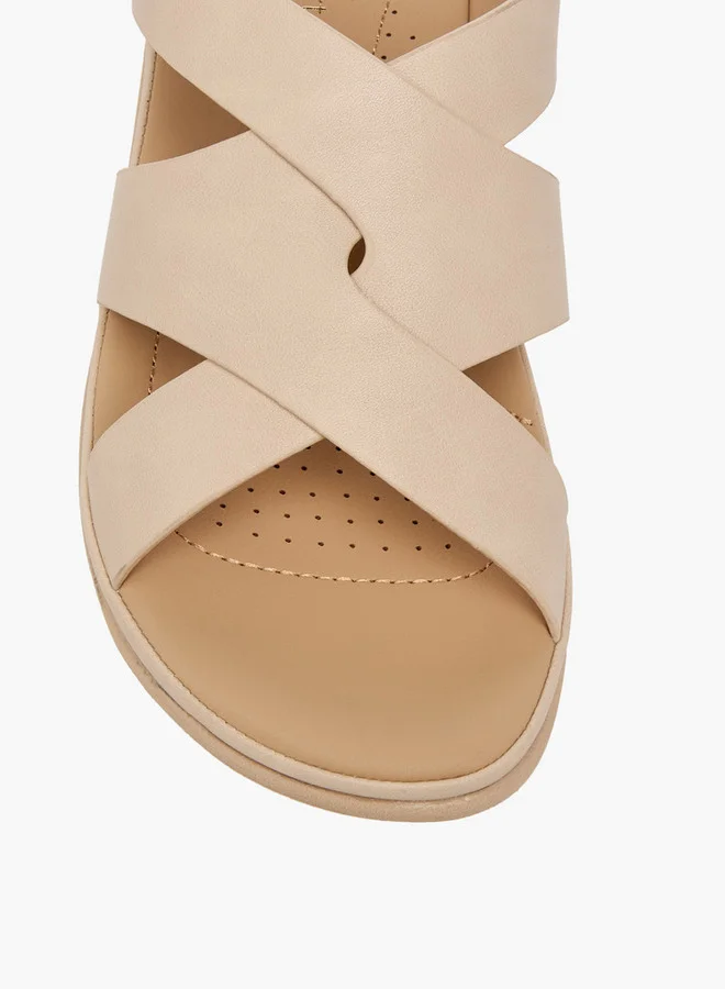 Le Confort Women's Solid Cross Strap Sandals with Buckle Closure