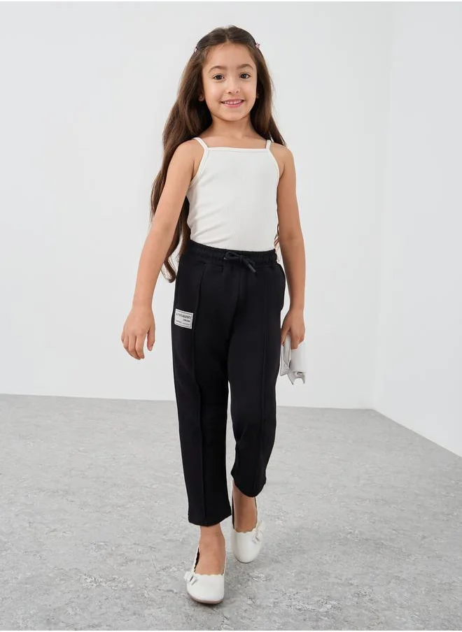 ستايلي Styli Girls Black Solid Drawstring Waist Joggers with Front Seam