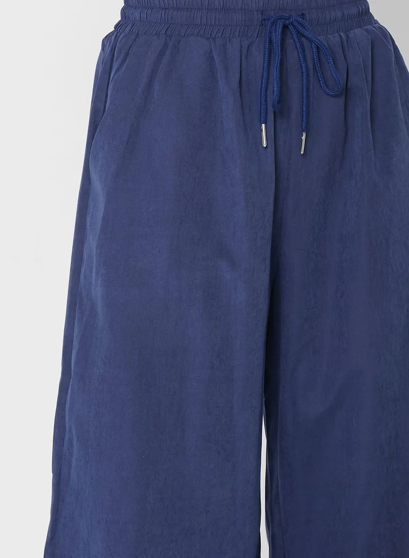 ELLA Wide Legged Ruffle Waist Pants