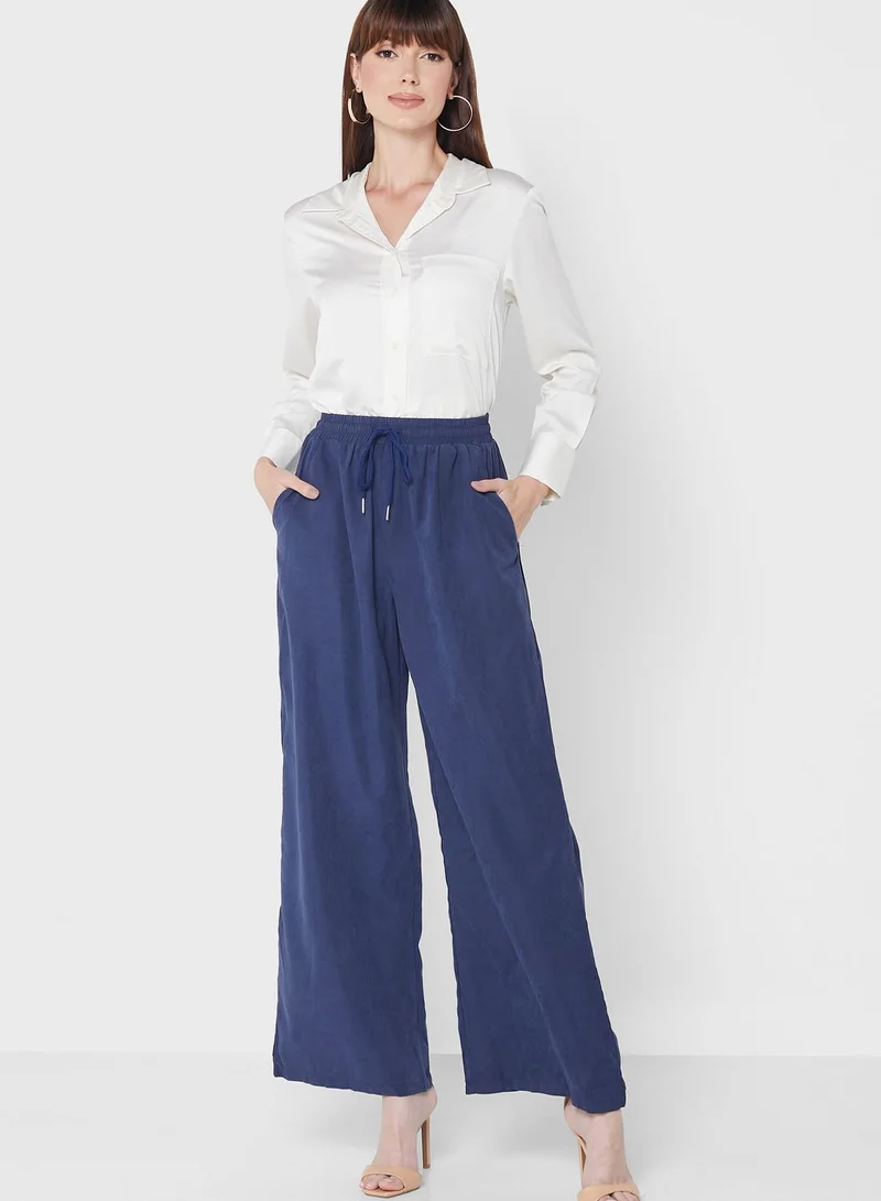 ELLA Wide Legged Ruffle Waist Pants
