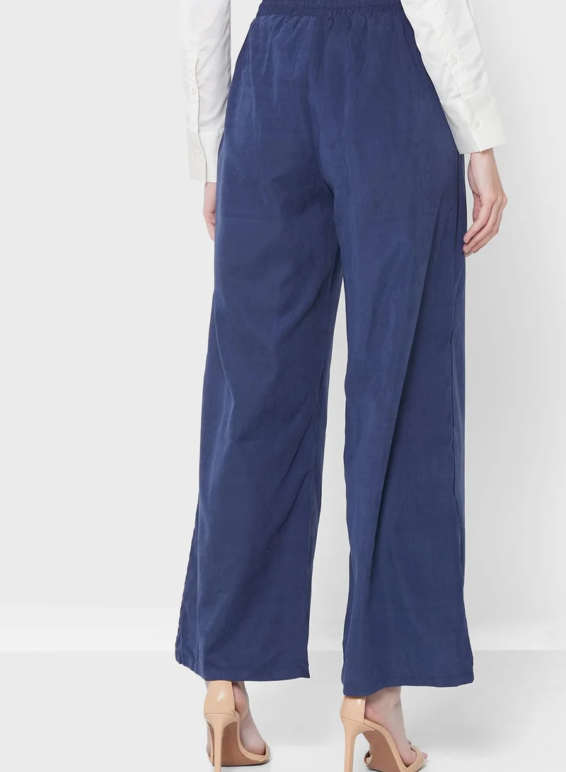ELLA Wide Legged Ruffle Waist Pants