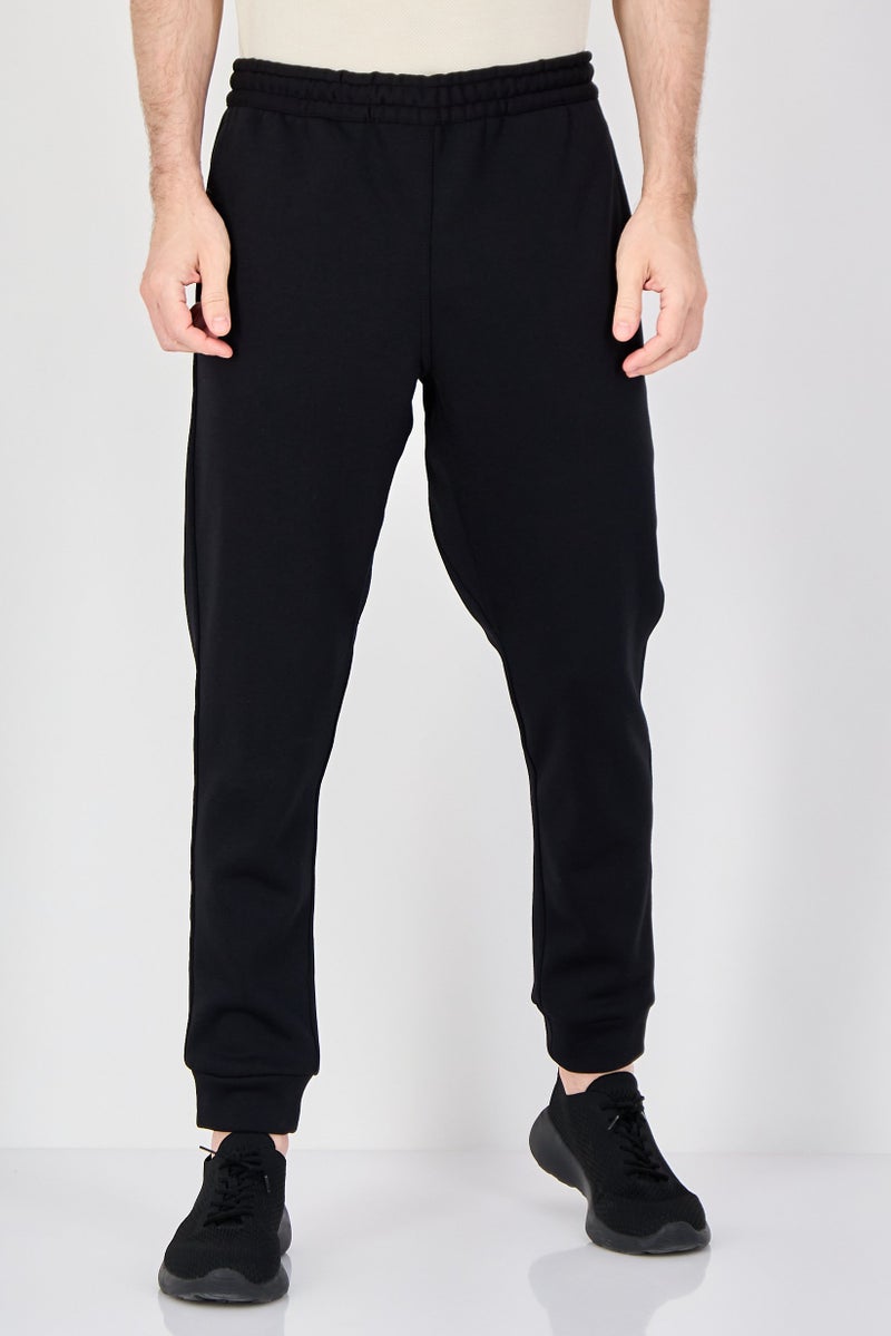 MOTION Men Sportswear Fit Outdoor Sweatpants, Black - Image 1