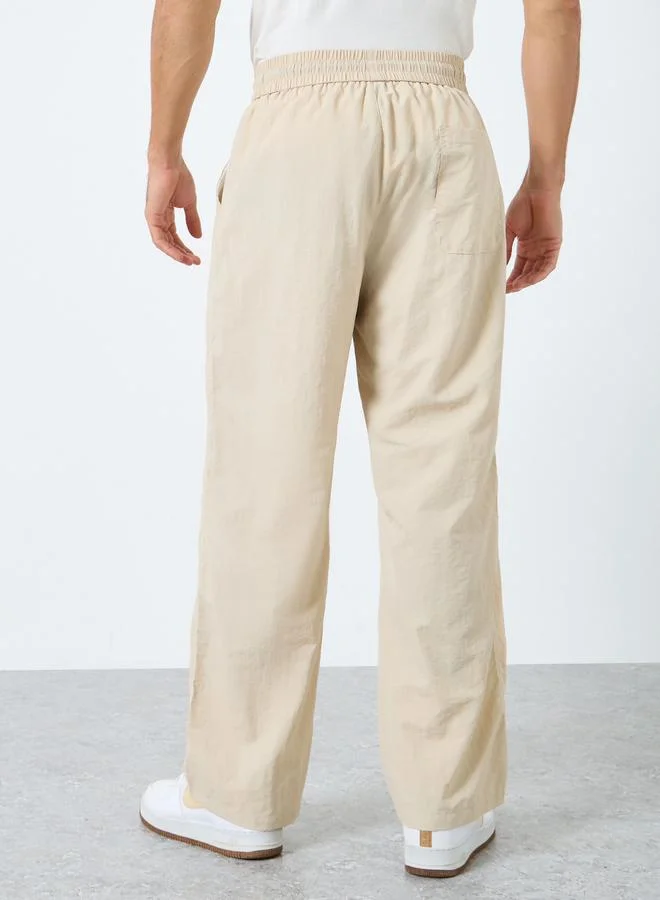 Styli Beige Men Straight Leg Pants with Drawstrings for Men | Best Price UAE