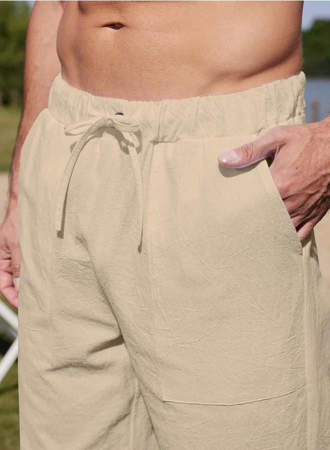 تايك تو بنطال سادة بقصة مريحة ورباط خصر