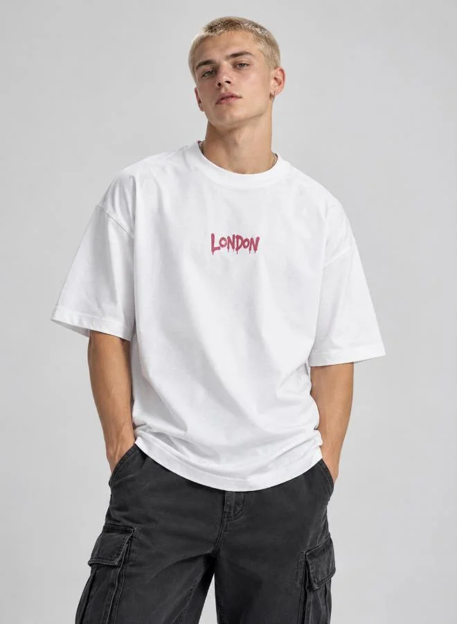 سفنتي فايف Oversized drop shoulder London 1997 back print T-shirt