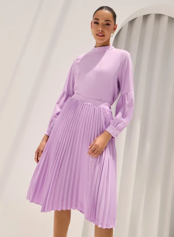 Styli Solid High Neck Top & Pleated Skirt Co-Ords