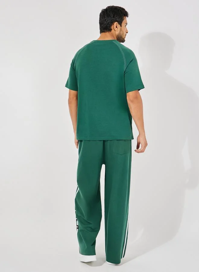 Styli Styli Premium Varsity Print Oversized T-Shirt and Wide Leg Joggers Co-Ords