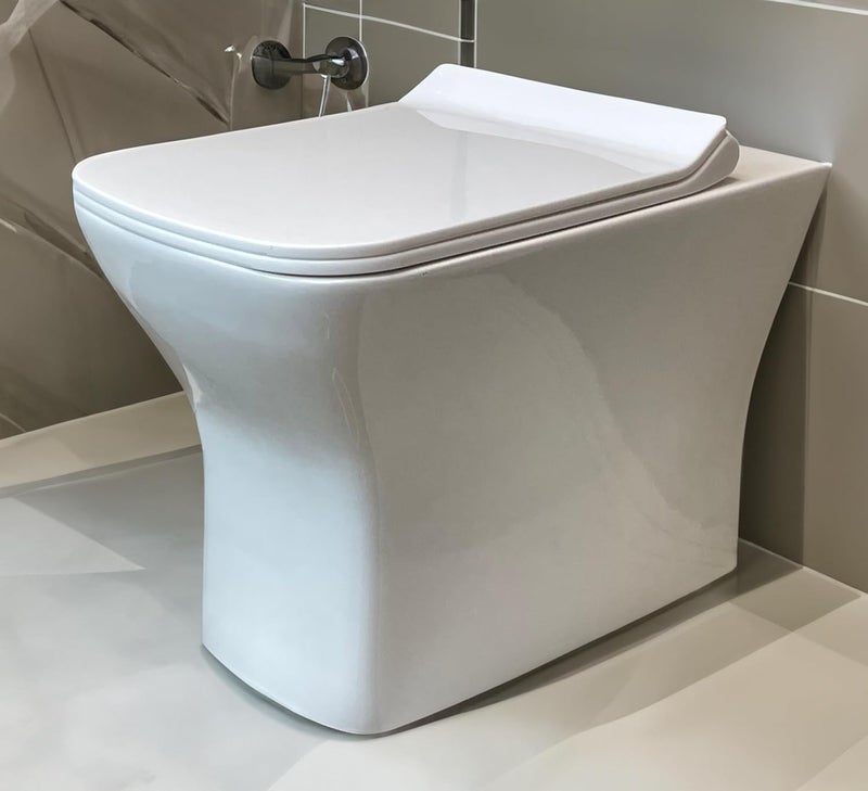Bherunath Meta Floor Mount CommodeWestern ToiletWater ClosetEWCWCEuropean Commode for Bathrooms Outlet is from Wall with Soft Close Seat Cover in White Color S TRAP  - Image 1