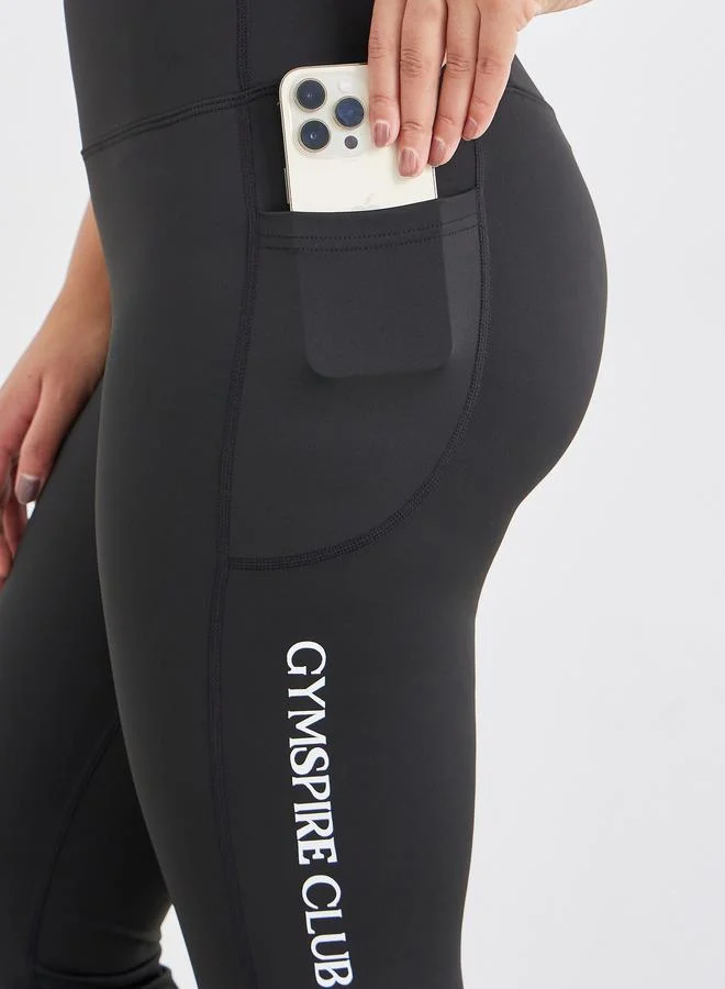 Styli Gymspire Edition - Label Broad Waist Side Pocket Flared Leggings with and Text Detail