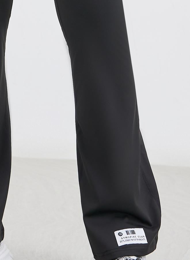 Styli Gymspire Edition - Label Broad Waist Side Pocket Flared Leggings with and Text Detail - Image 3