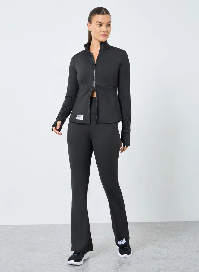 Styli Active Gymspire Edition - Label Broad Waist Side Pocket Flared Leggings with and Text Detail