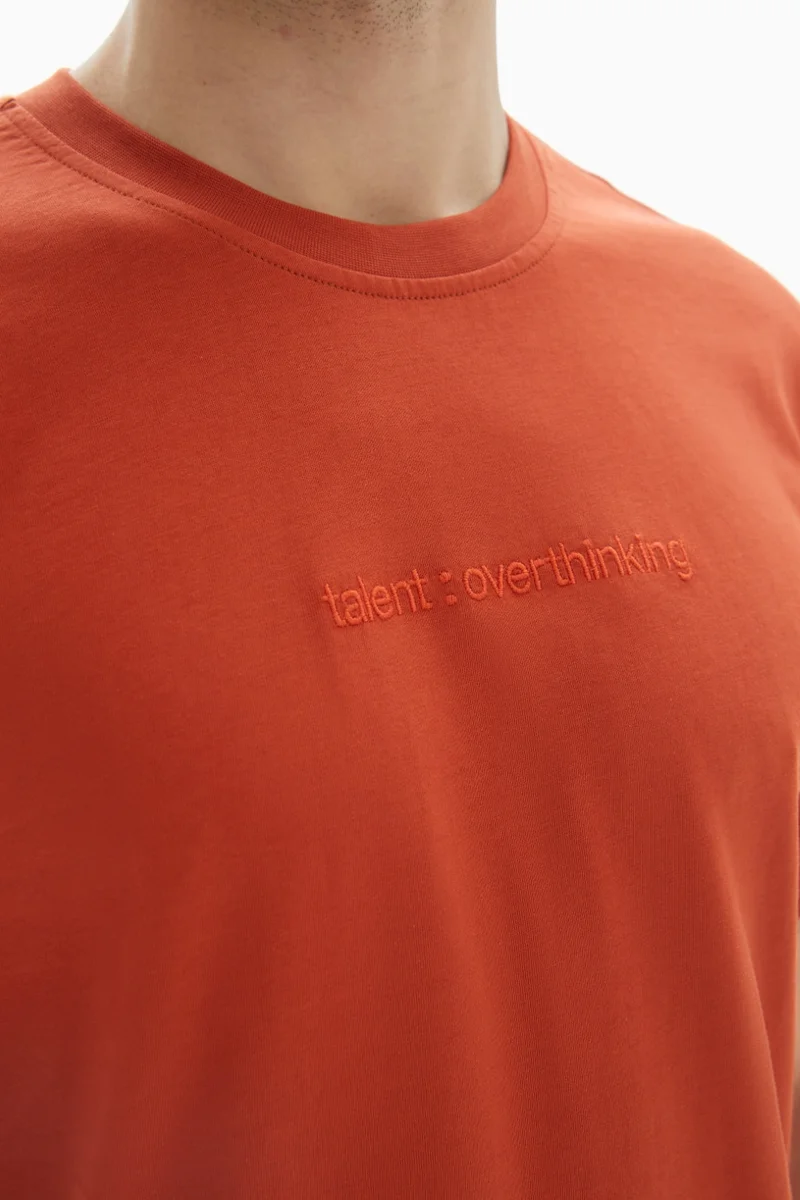 Wecre8 Orange "Talent" Embossed T-shirt By WECRE8