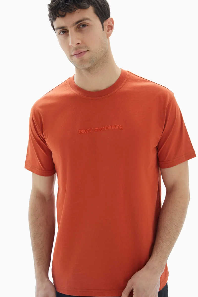 Wecre8 Orange "Talent" Embossed T-shirt By WECRE8