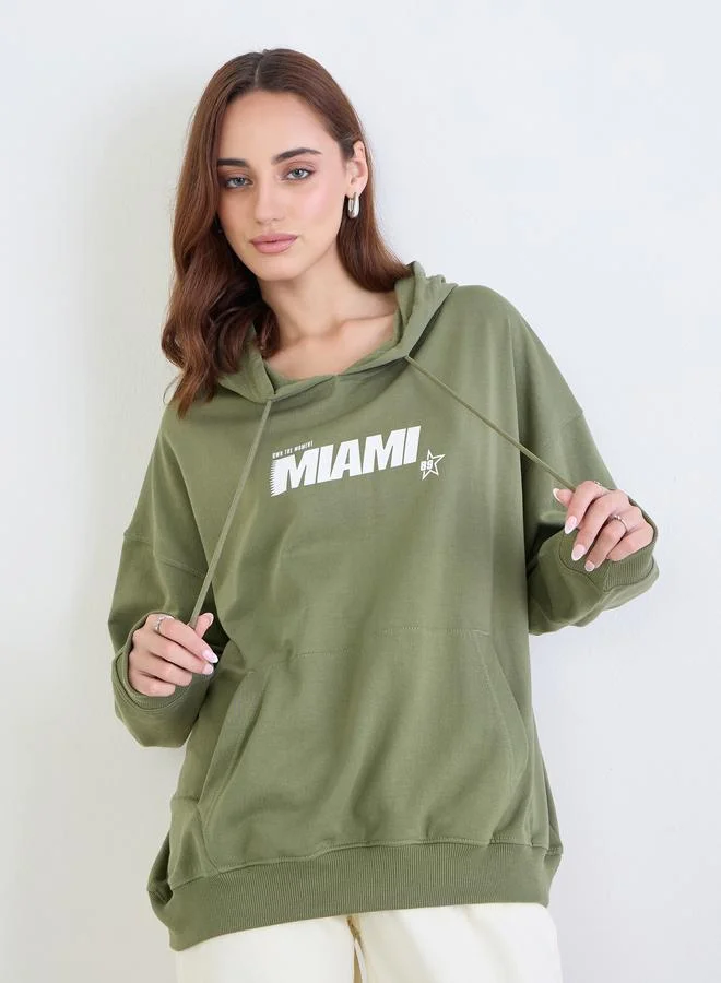 Styli Styli Green Graphic Print Oversized Hoodie