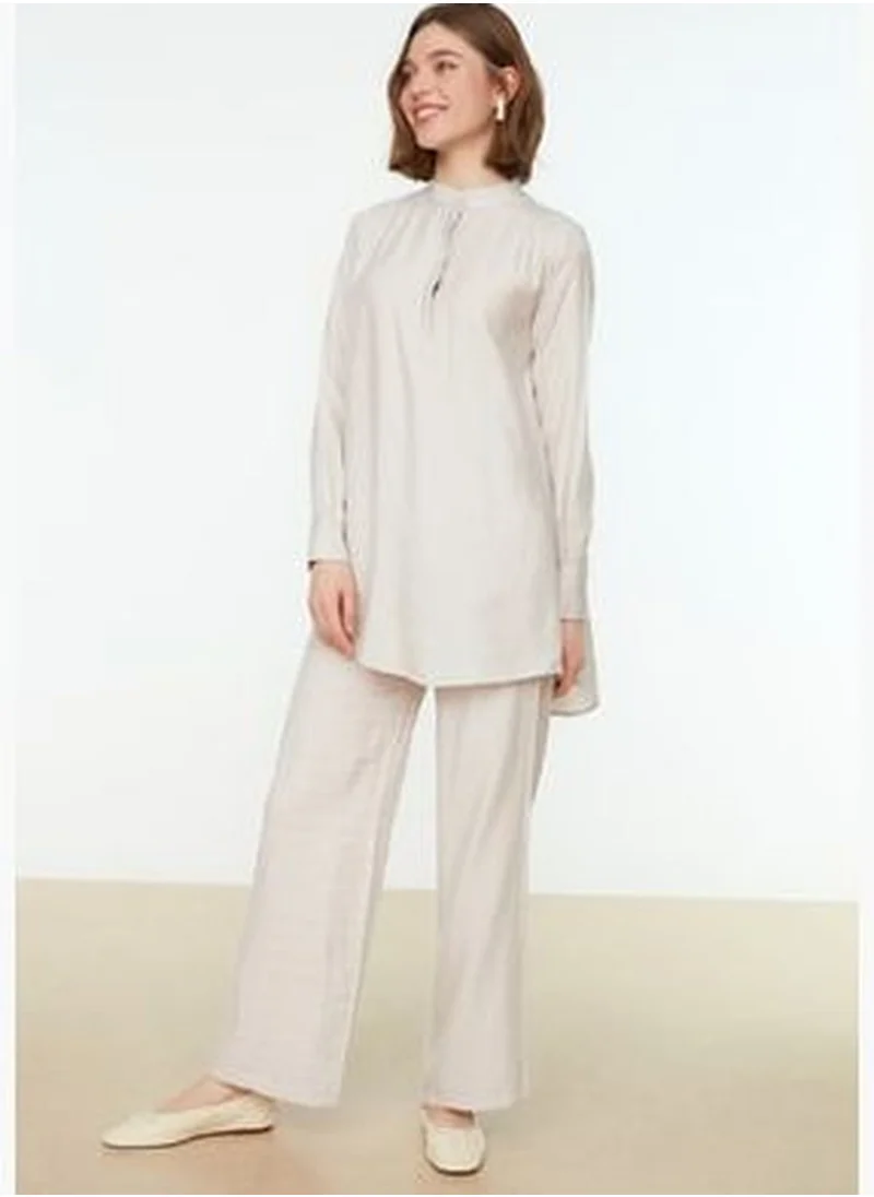 trendyol Cream Half-Concealed Fly Shoulder Detailed Tunic-Pants Woven Suit TCTSS22US0098