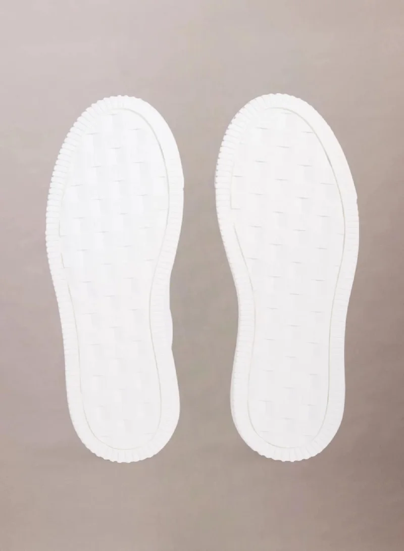 Calvin Klein Bright White/Black Leather Trainers for Women | Best Price UAE