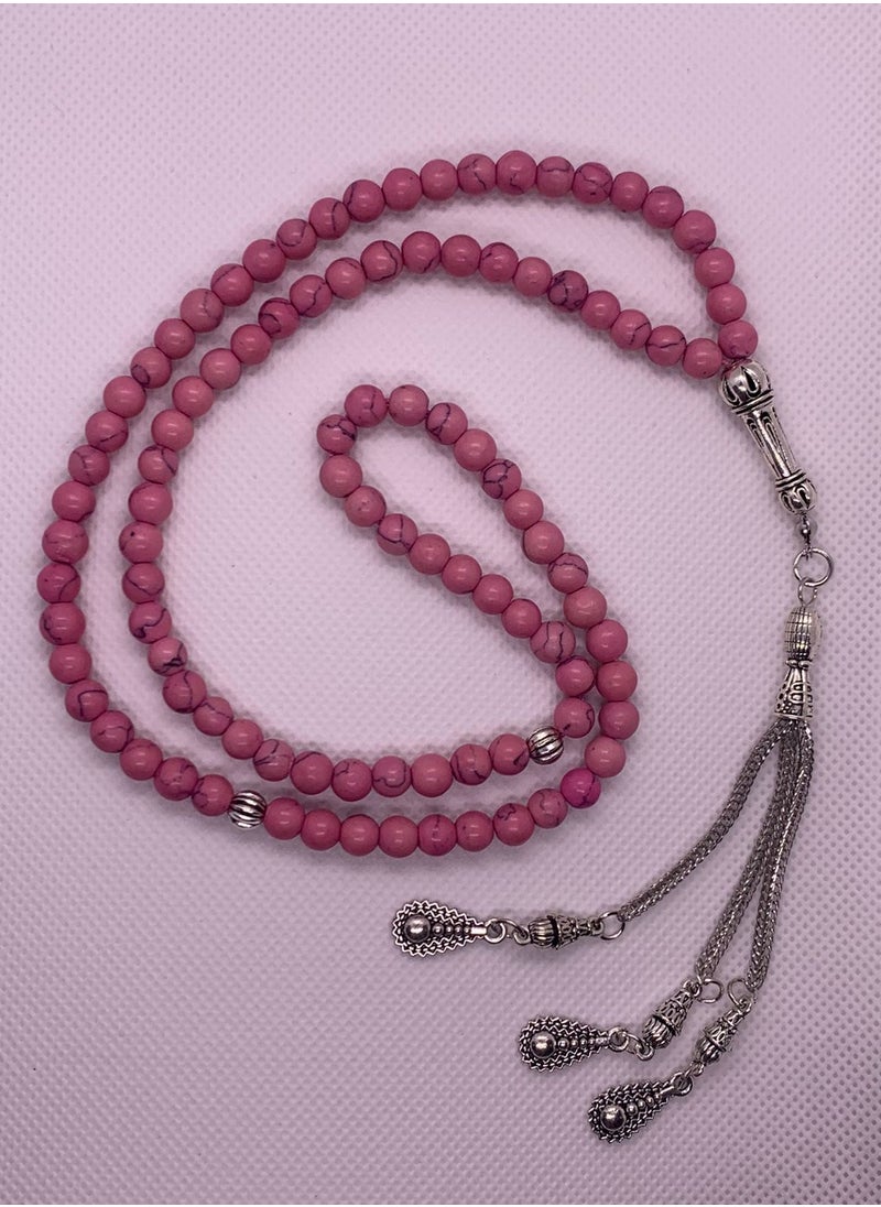 Generic - A wonderful rosary made of turquoise stone, characterized by an attractive and distinctive pink color. It consists of 100 beads with a distinctive and soft texture. We present it in a distinctive box to make it easy to gift to loved ones on all occasions, Hajj, Umrah, Ramadan, holidays, and others. - Image 1