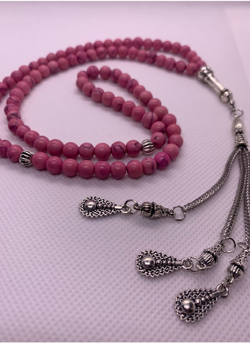 Generic - A wonderful rosary made of turquoise stone, characterized by an attractive and distinctive pink color. It consists of 100 beads with a distinctive and soft texture. We present it in a distinctive box to make it easy to gift to loved ones on all occasions, Hajj, Umrah, Ramadan, holidays, and others. - Image 1