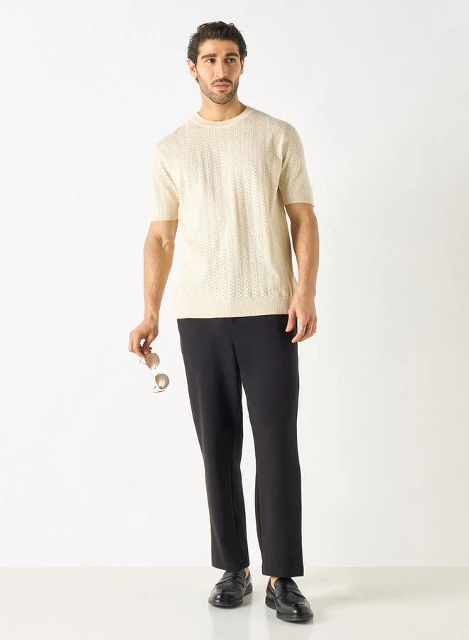 ايكونيك كنزة قصيرة بأكمام قصيرة بنقش مميز ورقبة دائرية