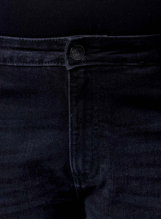 تايك تو جينز مطاطي بمقاس كبير بقصة بوت كت