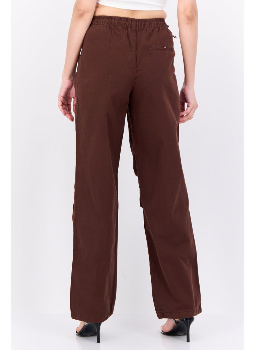 Women Regular Fit Plain Parachute Jogger Pants, Brown - pzsku/ZDDC2F8584984CCE8830FZ/45/_/1737642557/db496572-a61a-42d6-bc7a-c3fd178821b2