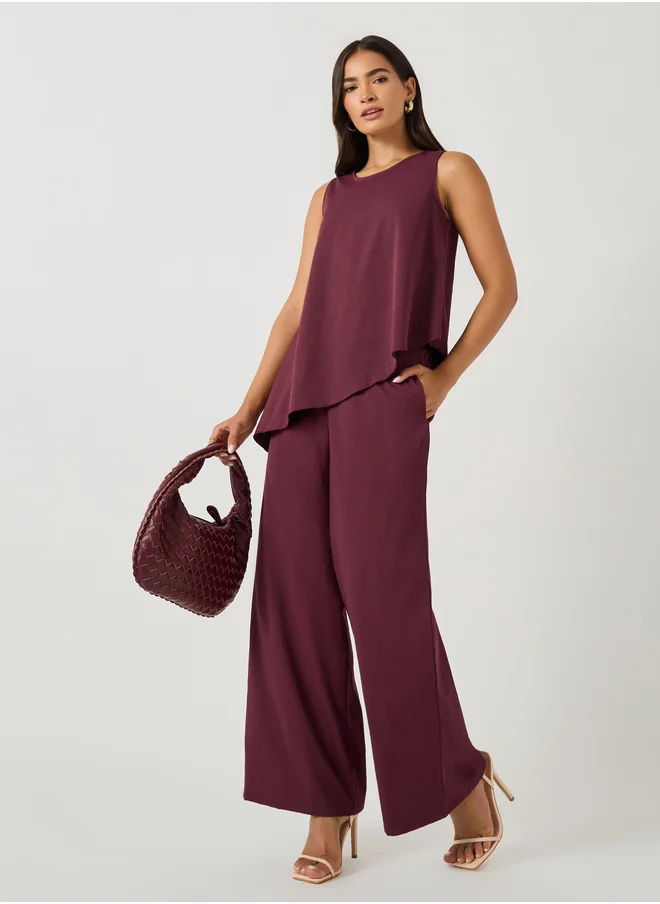 Styli Solid Sleeveless Asymmetric Hem Top and Wide Leg Pants Co-Ords