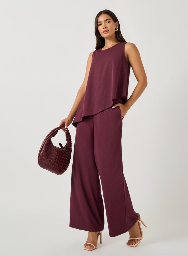 Styli Solid Sleeveless Asymmetric Hem Top and Wide Leg Pants Co-Ords  - Image 1