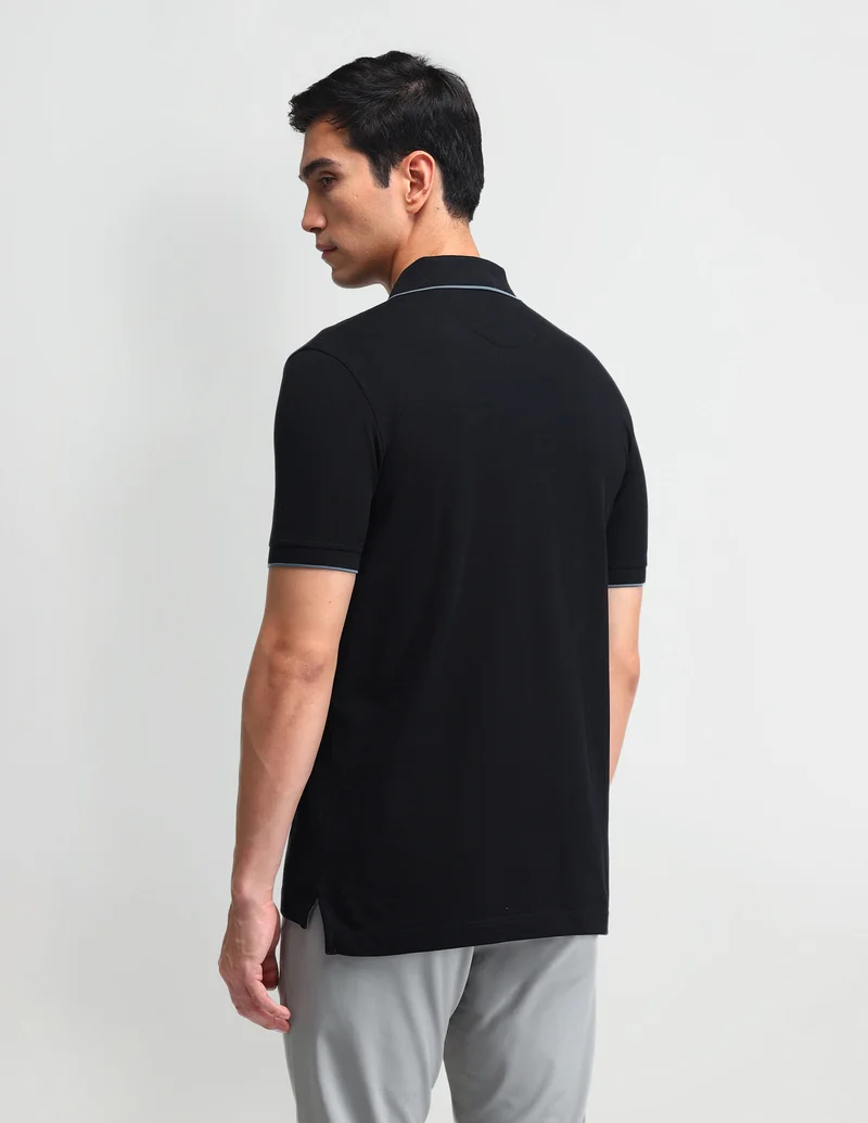 Arrow Black Solid Regular Fit Polo Shirt for Men | Best Price UAE