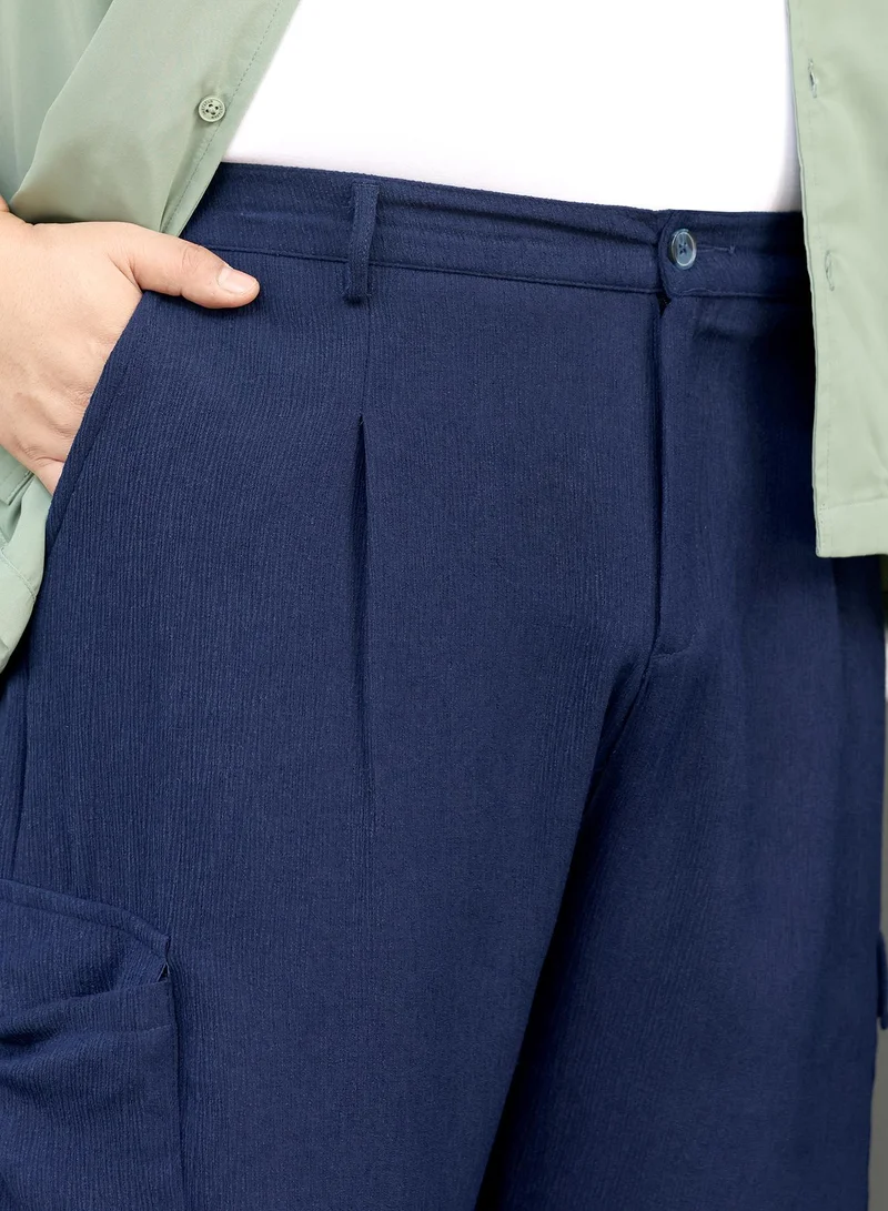Instafab Plus  Instafab Plus Men Pleated-Textured Cargo Trousers | Mid-Rise , Side Elasticated Stretch | Button Closure , Cuffed-Straight Hem | Solid Textured | Woven Fabric For Casual & Street Wear | Navy Blue for Men | Best Price UAE